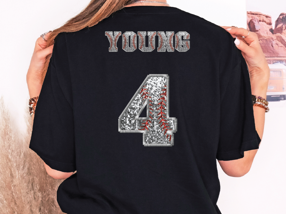 a woman wearing a young 4 t - shirt