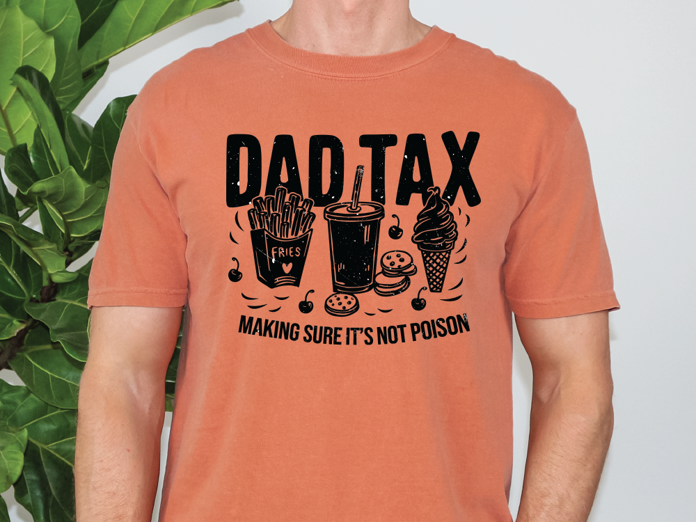 a man wearing a shirt that says dadtax making sure it's not