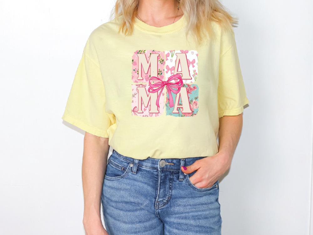 a woman wearing a yellow shirt with a pink bow