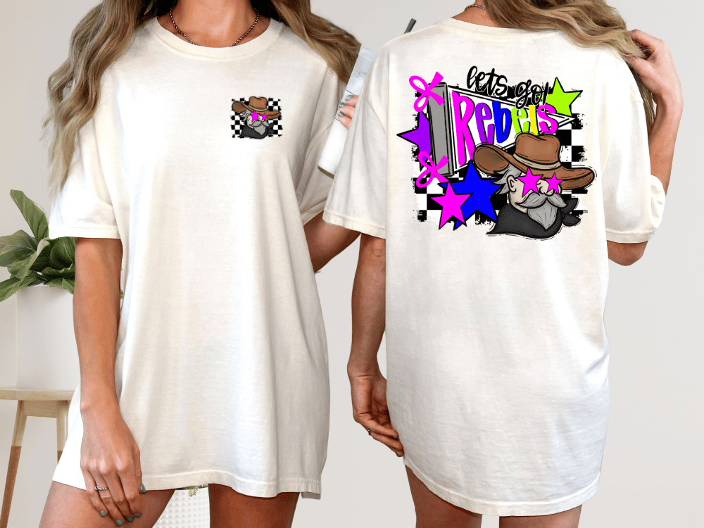 A woman wearing a white t-shirt with a colorful graphic design on the back.