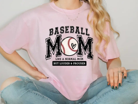 a woman wearing a pink baseball mom shirt