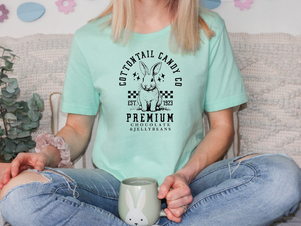 a woman sitting on a couch holding a coffee mug