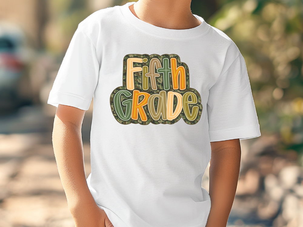 a young boy wearing a white shirt that says faith grade
