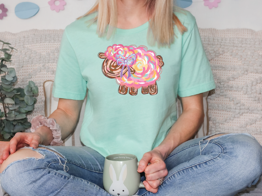 a woman sitting on a couch holding a coffee cup