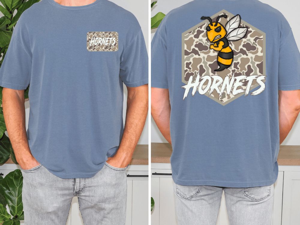 a man wearing a blue t-shirt with a graphic of a bee and the word "Horns" printed on it.