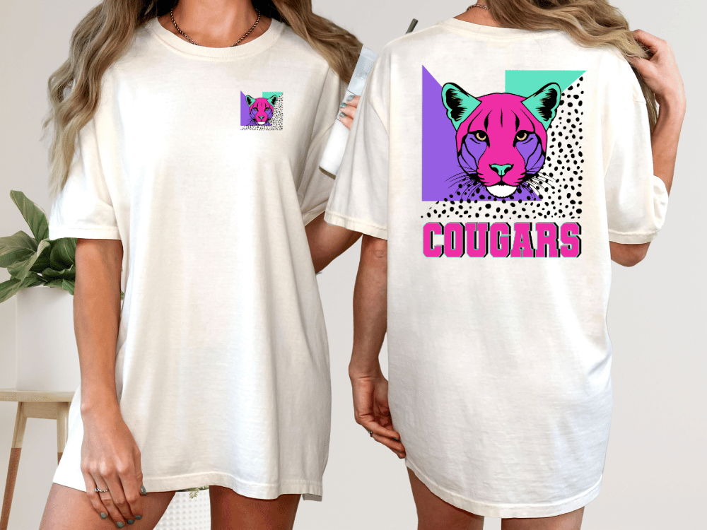 A woman wearing a white t-shirt with a graphic of a cougar and the word "Cougars" printed on the back.
