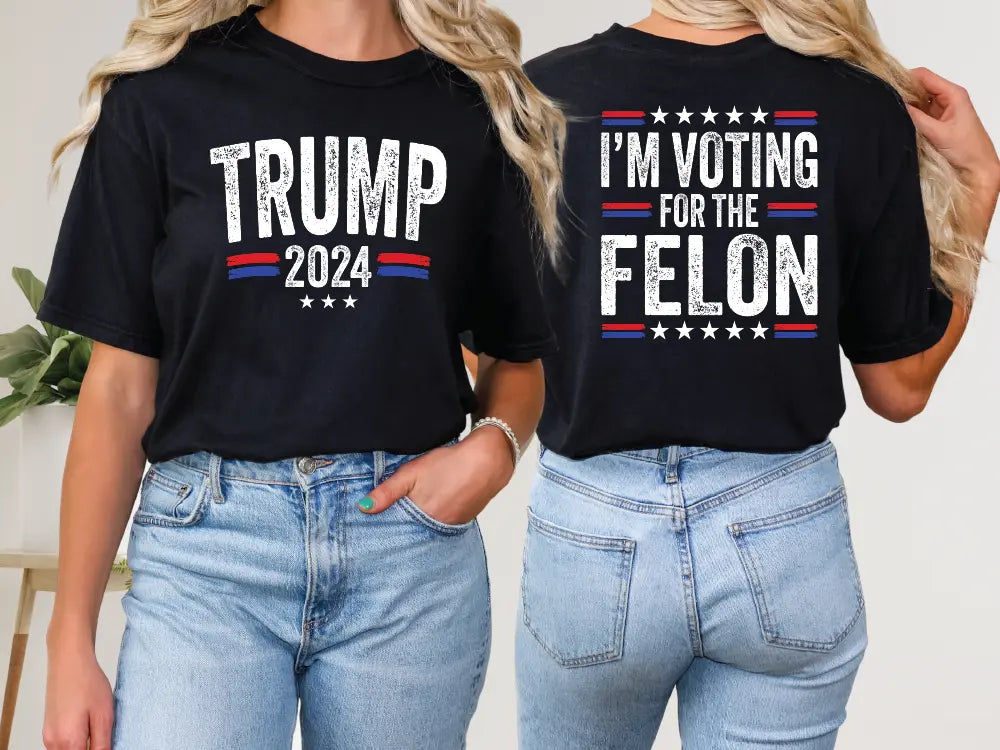 a pair of women wearing trump for the felon t - shirts