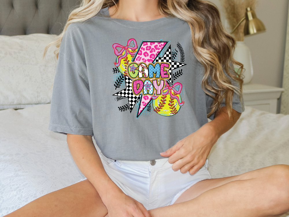 a woman sitting on a bed with her legs crossed