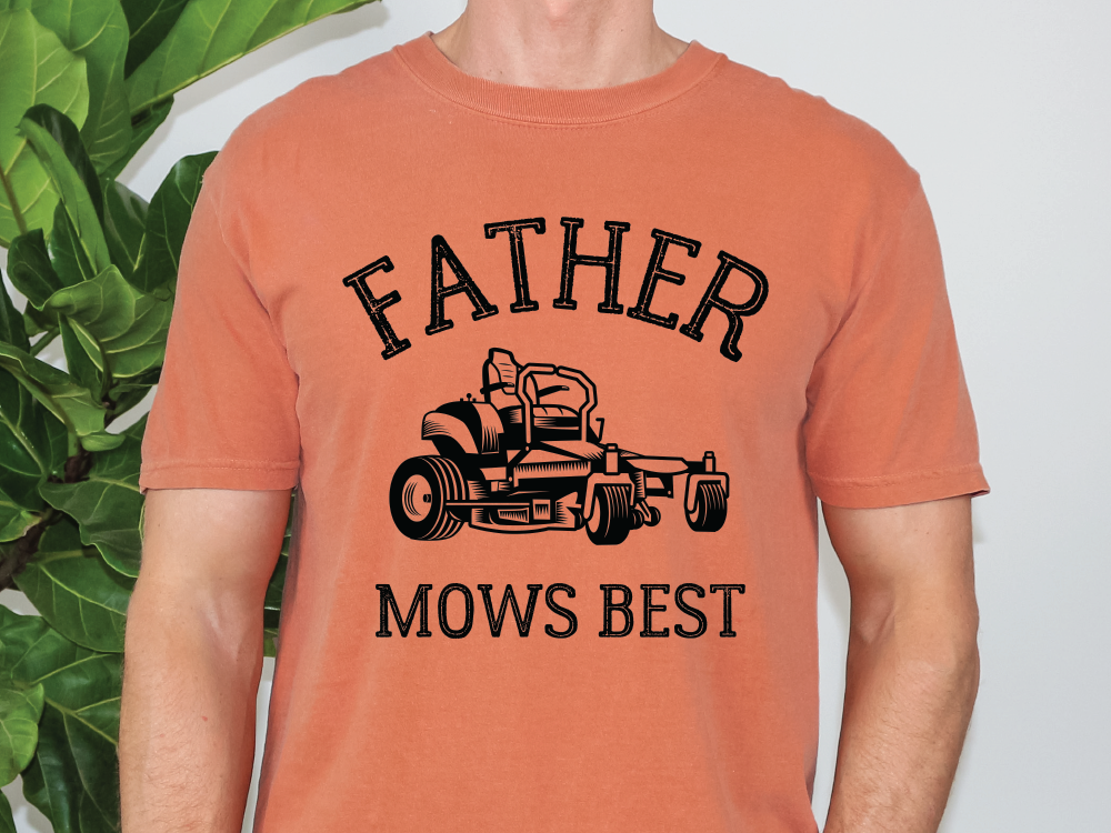 a man wearing an orange father mows best t - shirt
