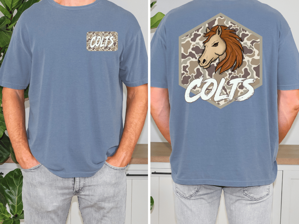 a man wearing a blue t-shirt with a graphic design on the back. The design features a horse's head with a camouflage pattern and the word "COLTS" written below it.