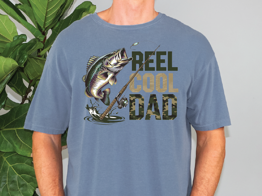 a man wearing a reel cool dad t - shirt