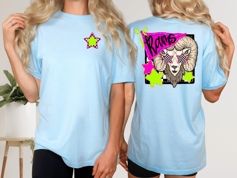 two women wearing light blue t-shirts with a graphic design on the back.