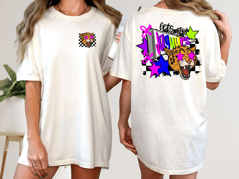 A white t-shirt with a graphic design on the back, featuring a checkered pattern, a leopard, and colorful stars and shapes.