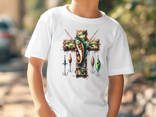 a young boy wearing a white t - shirt with a fish on it