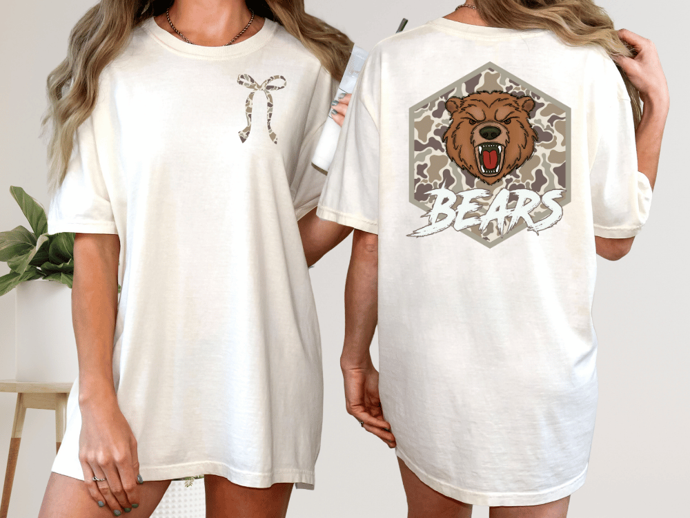 two women wearing white t-shirts with a graphic design on the back. The design features a brown bear with a bow on its neck and the word "BEARS" written below the bear's head.