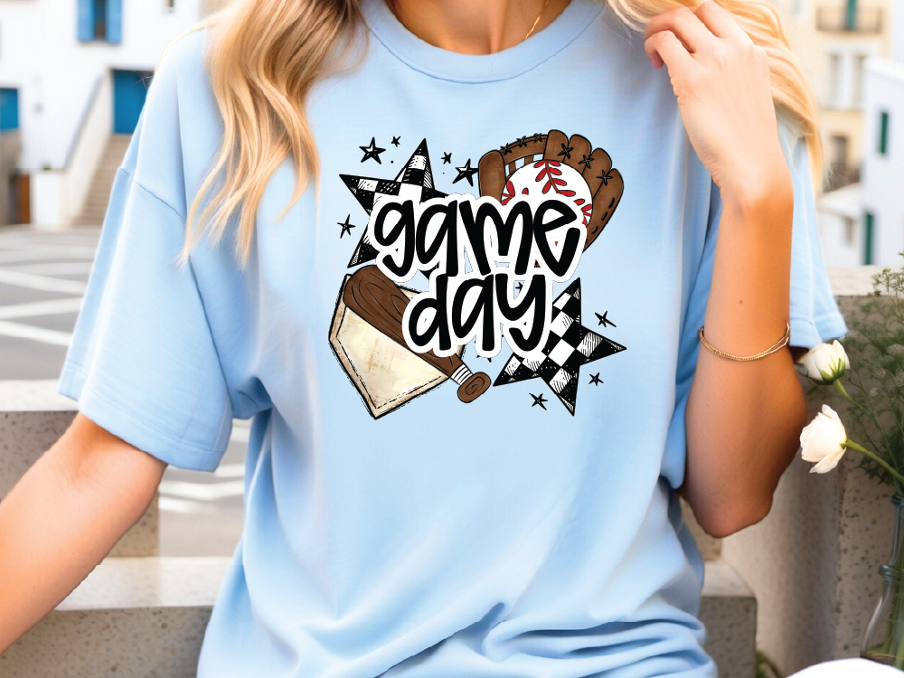 a woman wearing a t - shirt that says game day