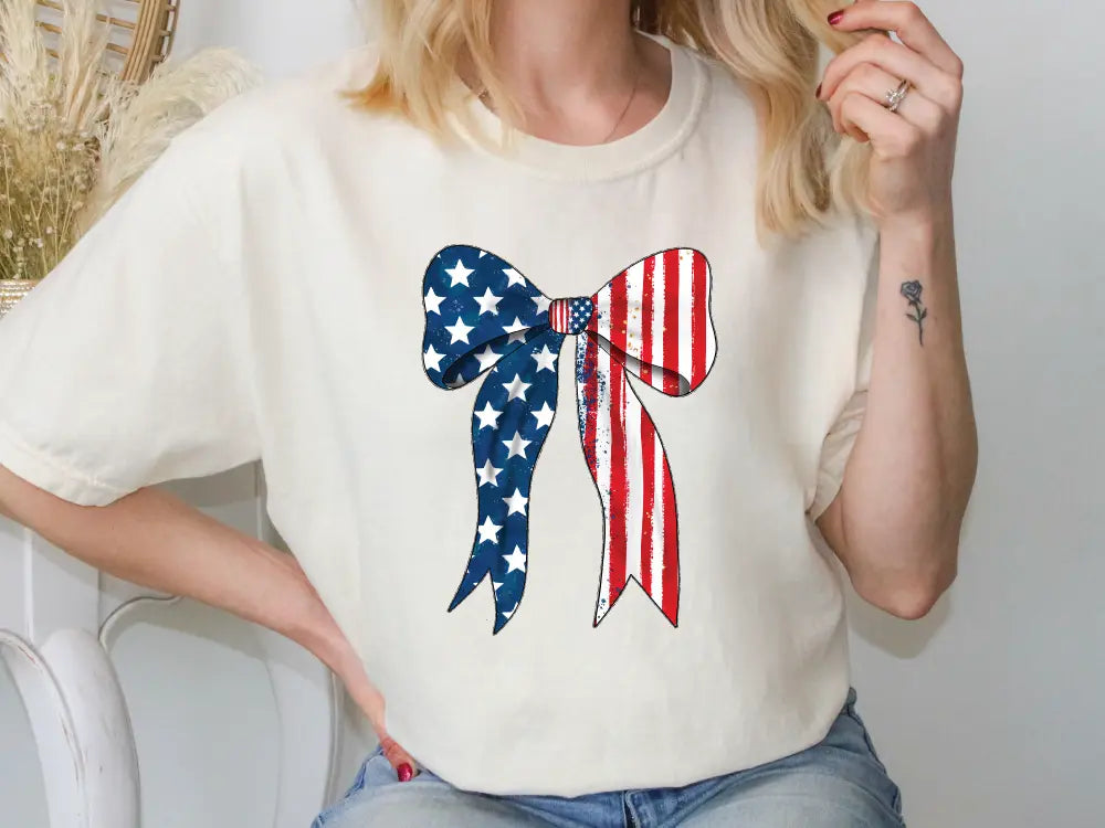 a woman wearing a patriotic bow t - shirt