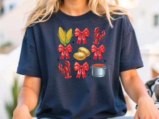 a woman sitting on a bench wearing a t - shirt with bows on it