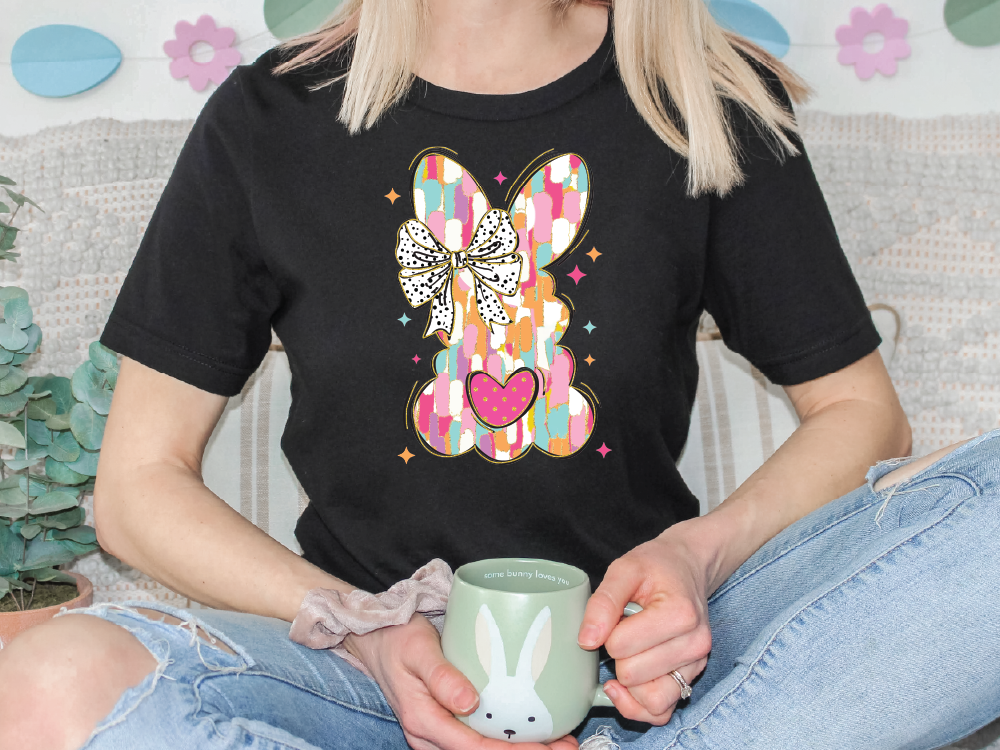 a woman sitting on a couch holding a coffee mug