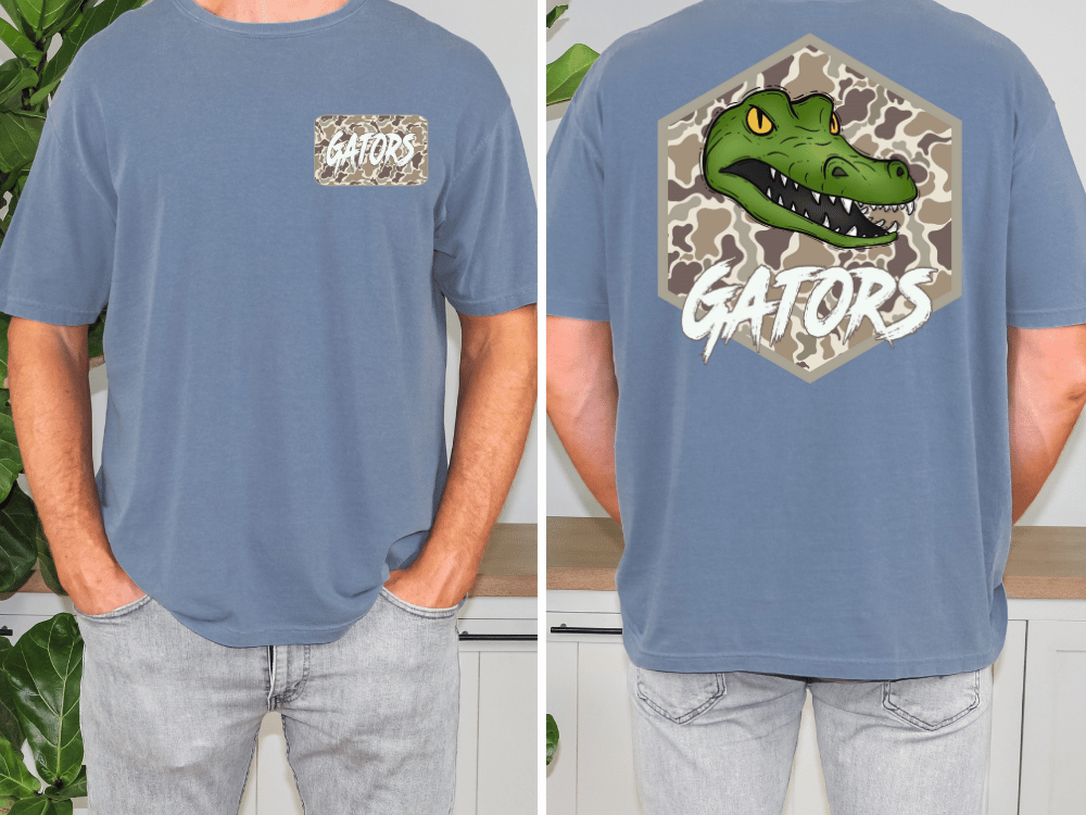 a man wearing a blue t-shirt with a graphic of a green alligator and the word "GATORS" printed on the back.