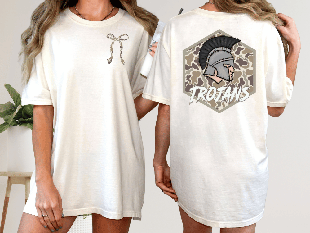 two different views of a white t-shirt with a graphic design on the back. The design features a helmet with a laurel wreath and the word "TROANS" written on it.
