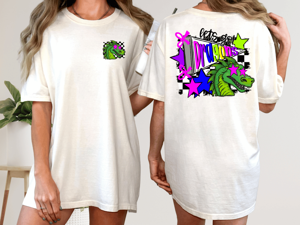A white t-shirt with a colorful graphic design on the back, featuring a green dinosaur and various geometric shapes and patterns.