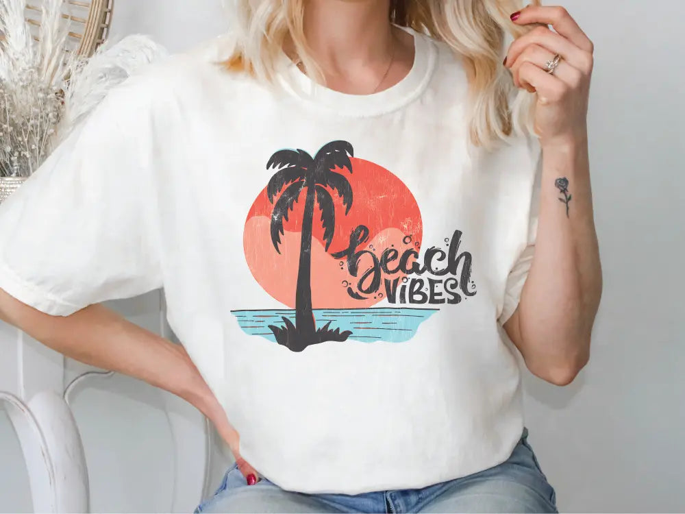 a woman wearing a white beach vibes t - shirt