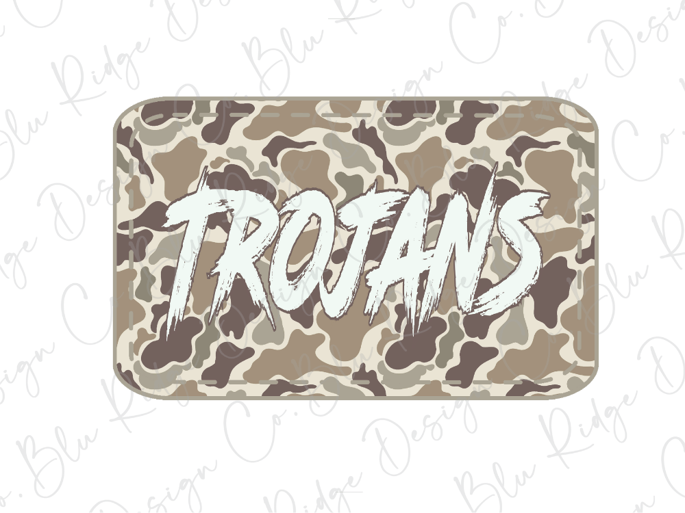 A rectangular sticker or decal with the word "TROJANS" written in a stylized, graffiti-like font against a camouflage pattern background.