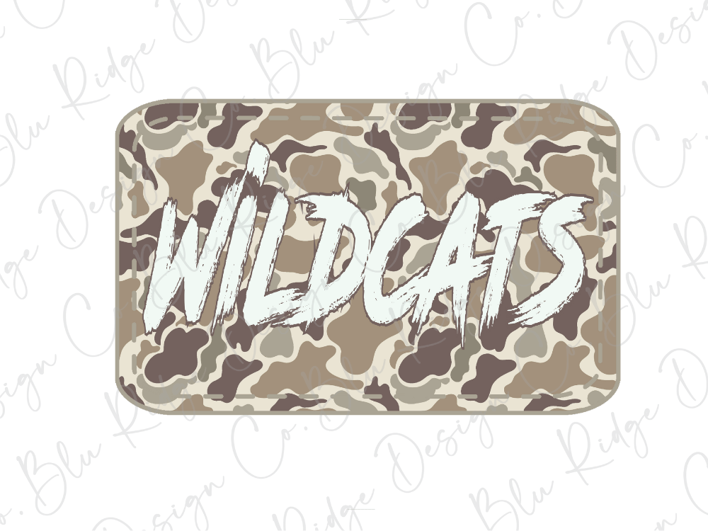 A camouflage-patterned sticker or decal with the word "WILDCATS" written in bold, white letters.