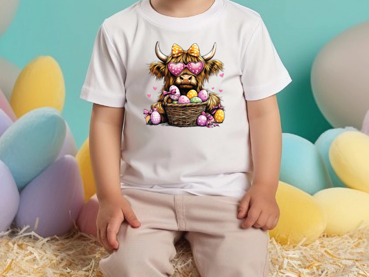 a little boy sitting in front of some balloons