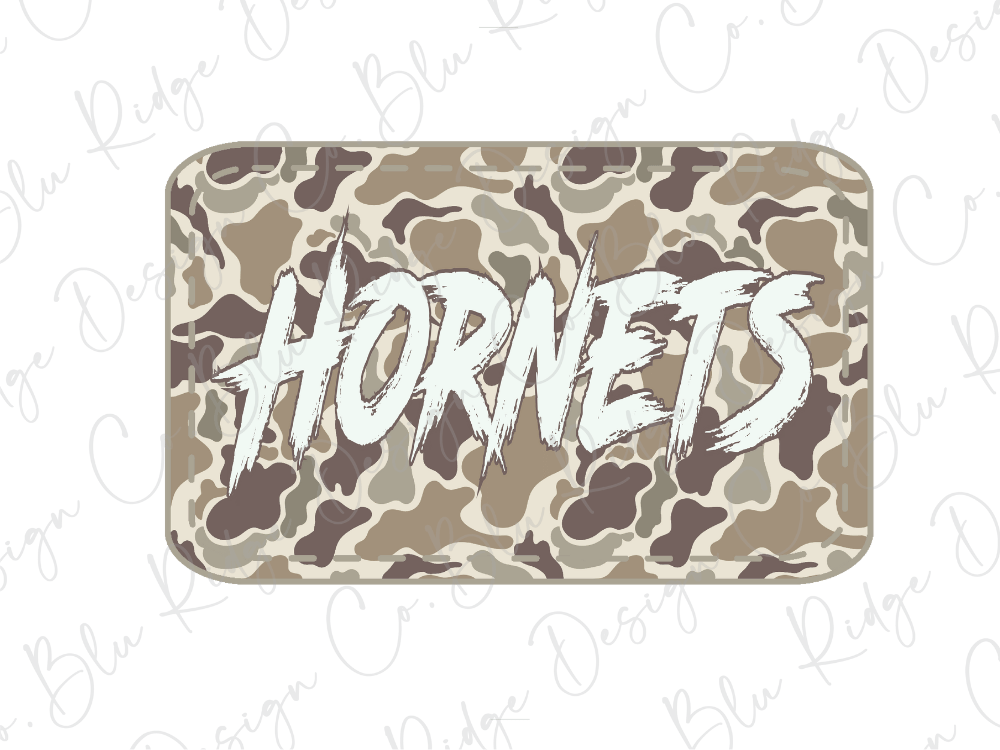 A camouflage-patterned rectangular object with the word "Horns" written in a bold, stylized font.