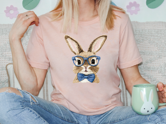 a woman sitting on a couch holding a coffee mug