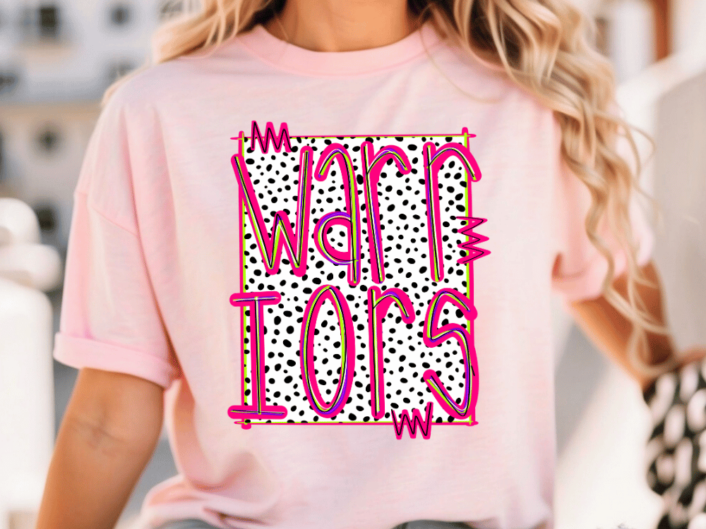 A woman wearing a pink t-shirt with the text "Warriors" printed on it.