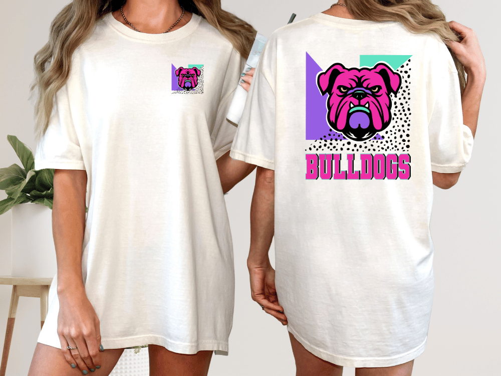 A woman wearing a white t-shirt with a graphic of a bulldog and the word "Bulldogs" printed on the back.