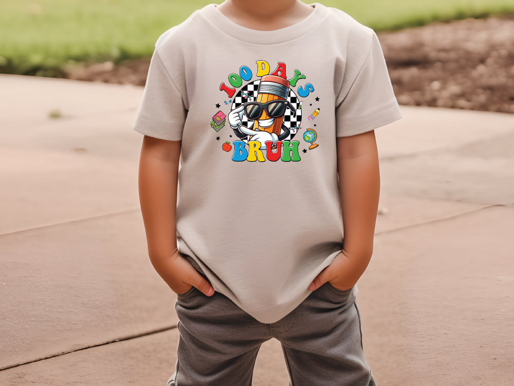 a little boy that is wearing a shirt