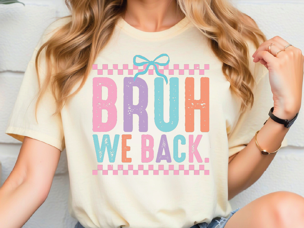 a woman wearing a t - shirt that says bruh we back