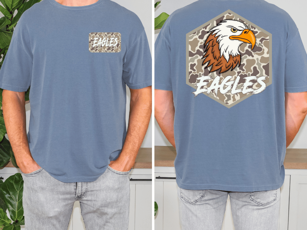 a man wearing a blue t-shirt with a graphic of an eagle and the word "EAGLES" printed on it.