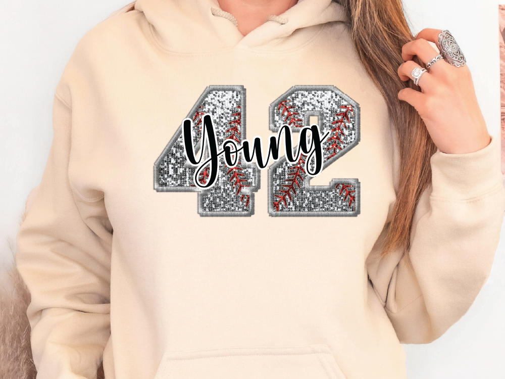a woman wearing a hoodie with the number 42 on it