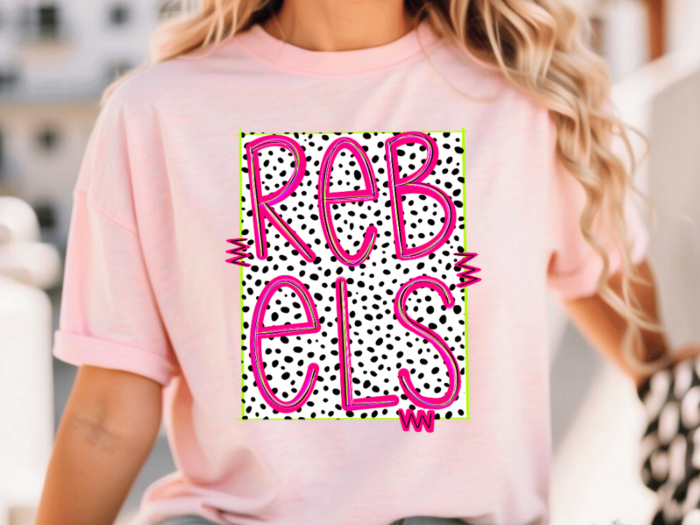A woman wearing a pink t-shirt with the text "REBELS" printed on it.