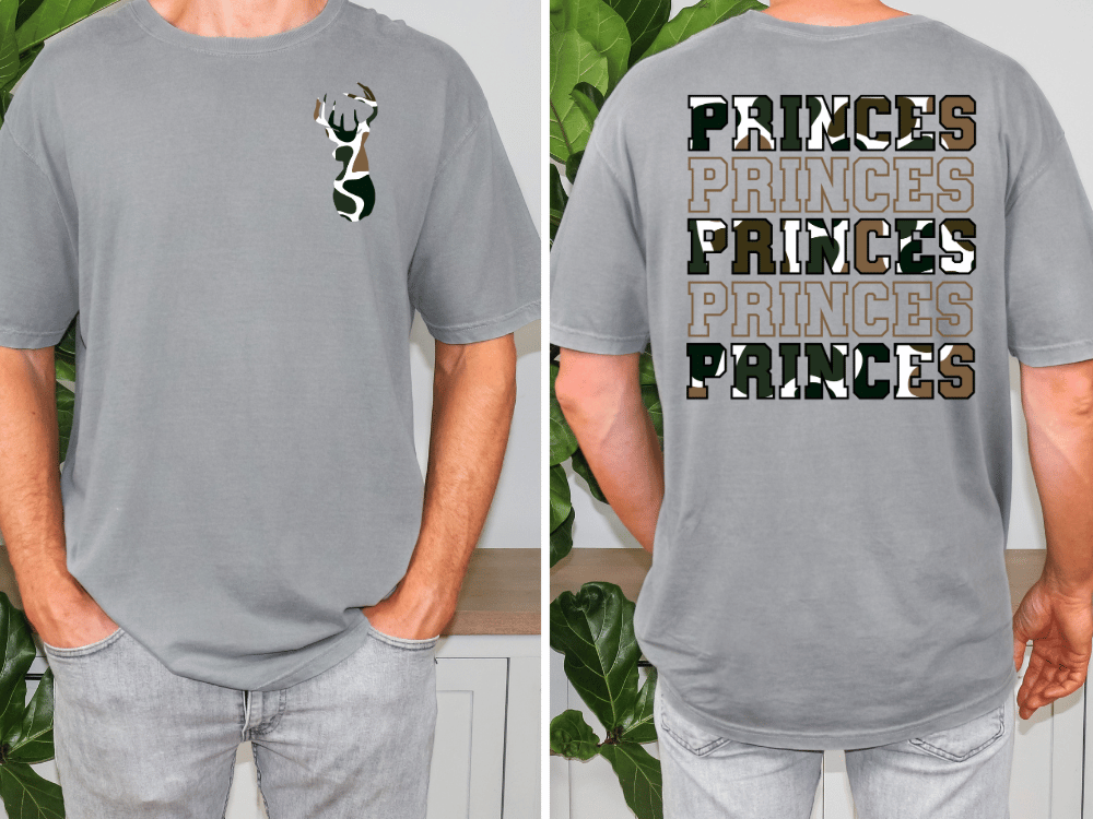a man wearing a gray t-shirt with a camouflage pattern and the text "PRINCES" printed on the back.