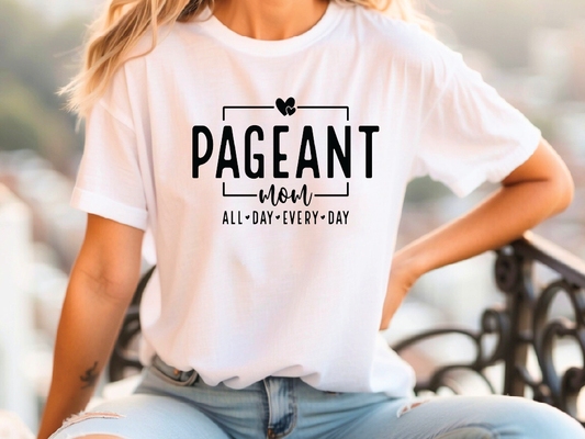 a woman wearing a t - shirt that says pageant work all day every day