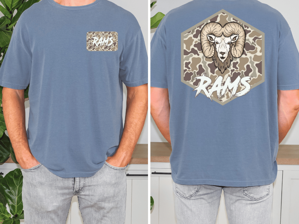 a man wearing a blue t-shirt with a camouflage pattern and a graphic of a ram on the back.