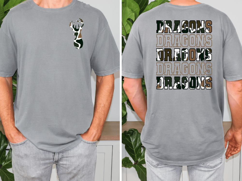 a man wearing a gray t-shirt with a camouflage pattern and text on the back.