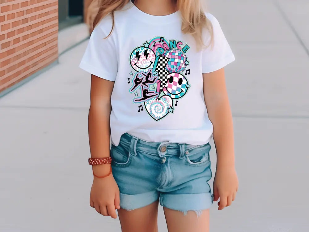 a little girl wearing a white shirt and denim shorts