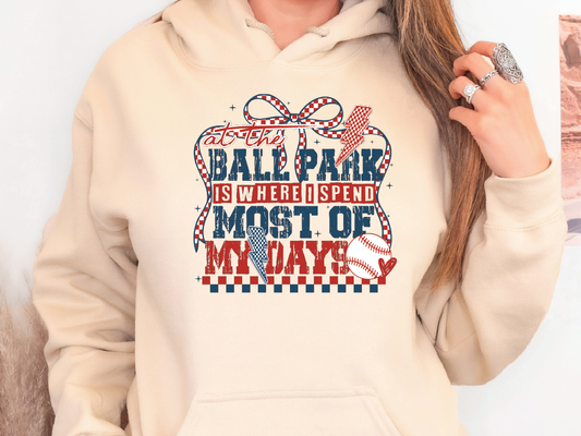 a woman wearing a ball park is where i spend most of my days