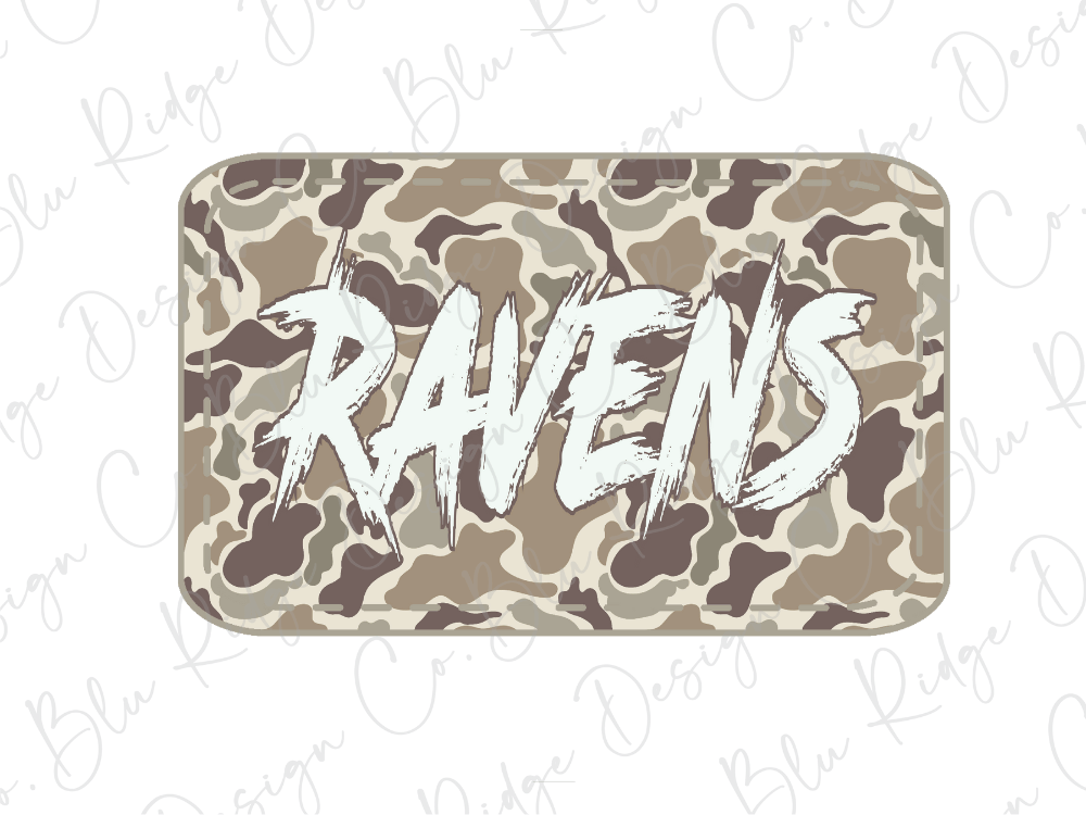 A camouflage-patterned rectangular object with the word "RAVENS" written in a stylized, graffiti-like font.