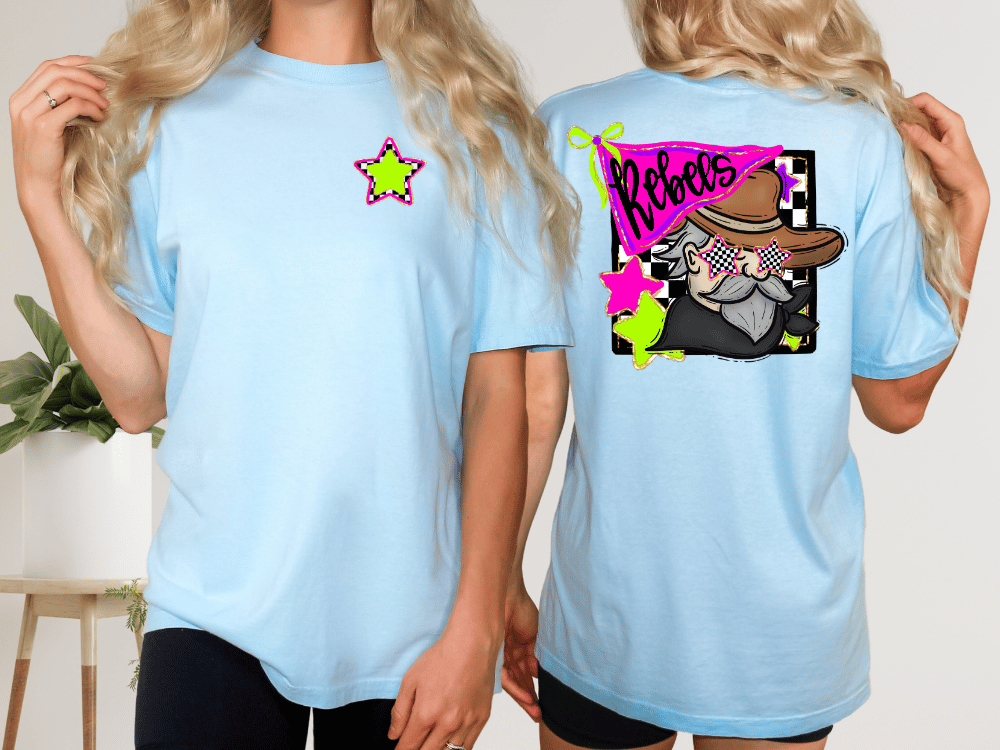 two women wearing light blue t-shirts with colorful designs on the back.