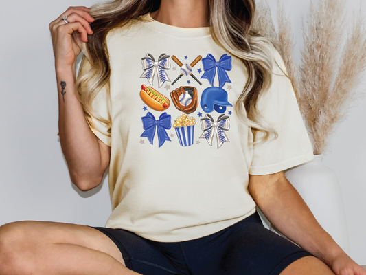 a woman sitting on a chair wearing a t - shirt with a hot dog and