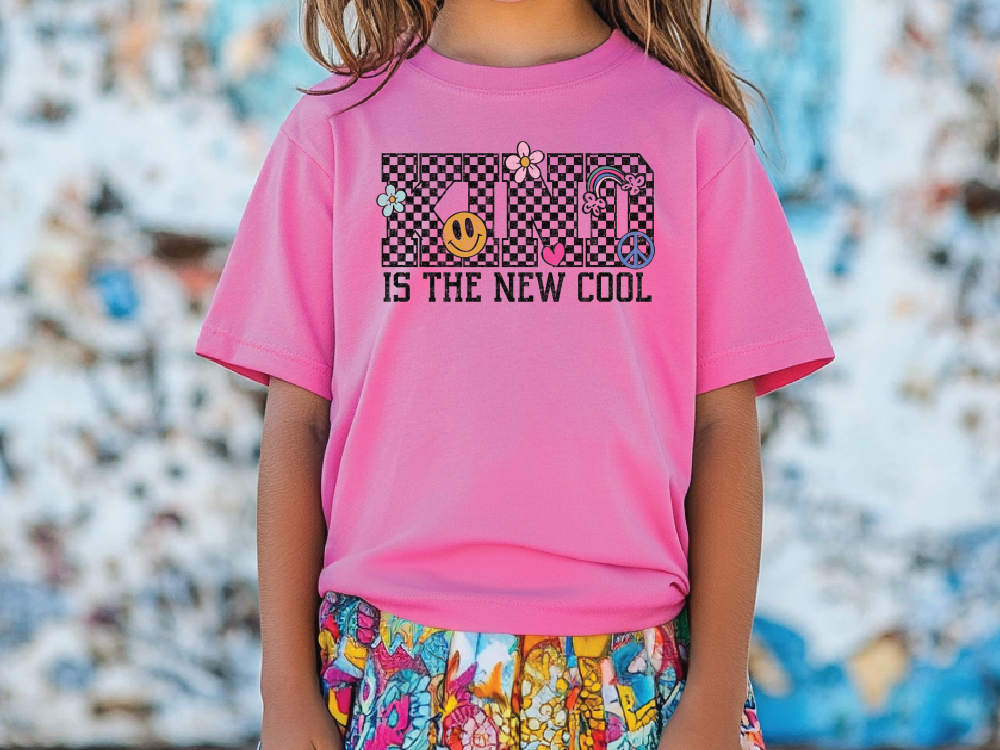 a little girl wearing a pink shirt with the words gap is the new cool