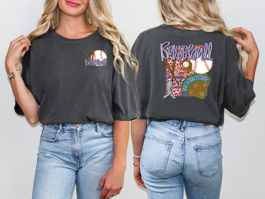 a woman wearing a black shirt with a baseball design on it